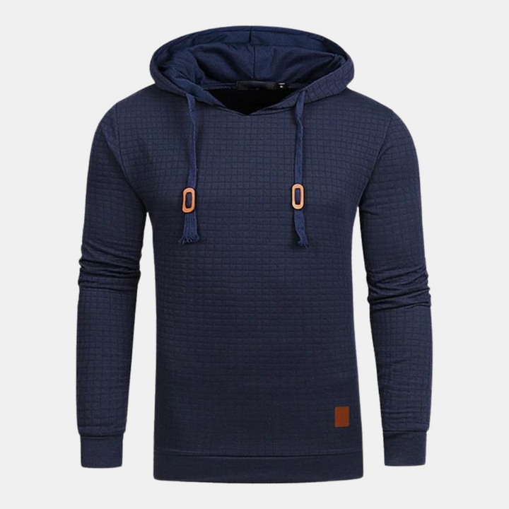 Dunkelblauer Kapuzenpullover mit Karomuster und Lederpatch am Saum