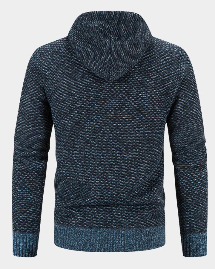 Rückenansicht der Strickjacke in Blau meliert mit Kapuze und Rippbündchen