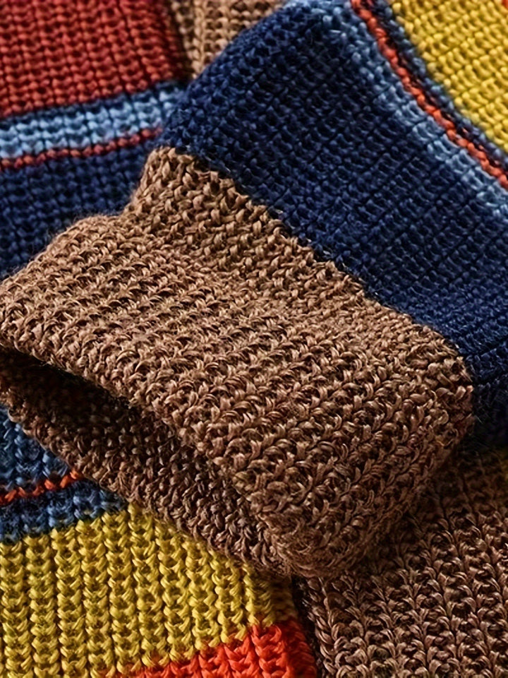 Texturnahaufnahme des groben Strickmusters in Blau, Gelb und Braun
