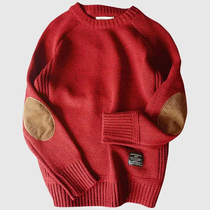 Roter Strickpullover mit Ellbogenpatches aus Wildlederimitat und Rundhalsausschnitt