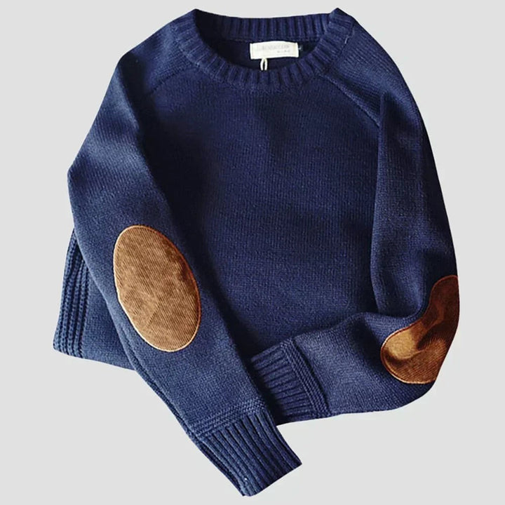 Marineblauer Strickpullover mit braunen Ellbogenpatches und geripptem Saum