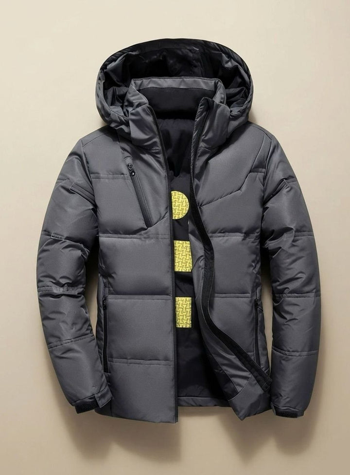 Anthrazitfarbene Winterjacke mit Kapuze und funktionalen Reißverschlusstaschen