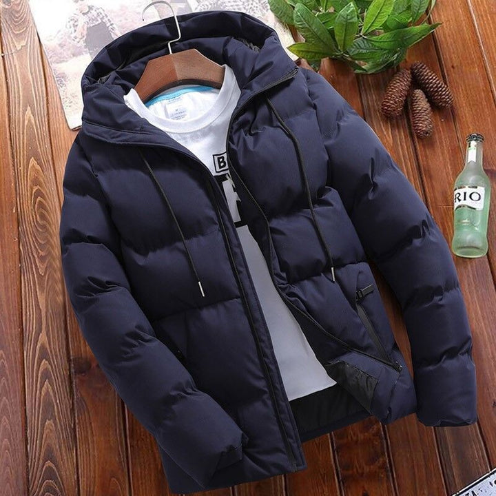 Dunkelblaue wattierte Jacke mit Kapuze, Stehkragen und Seitentaschen