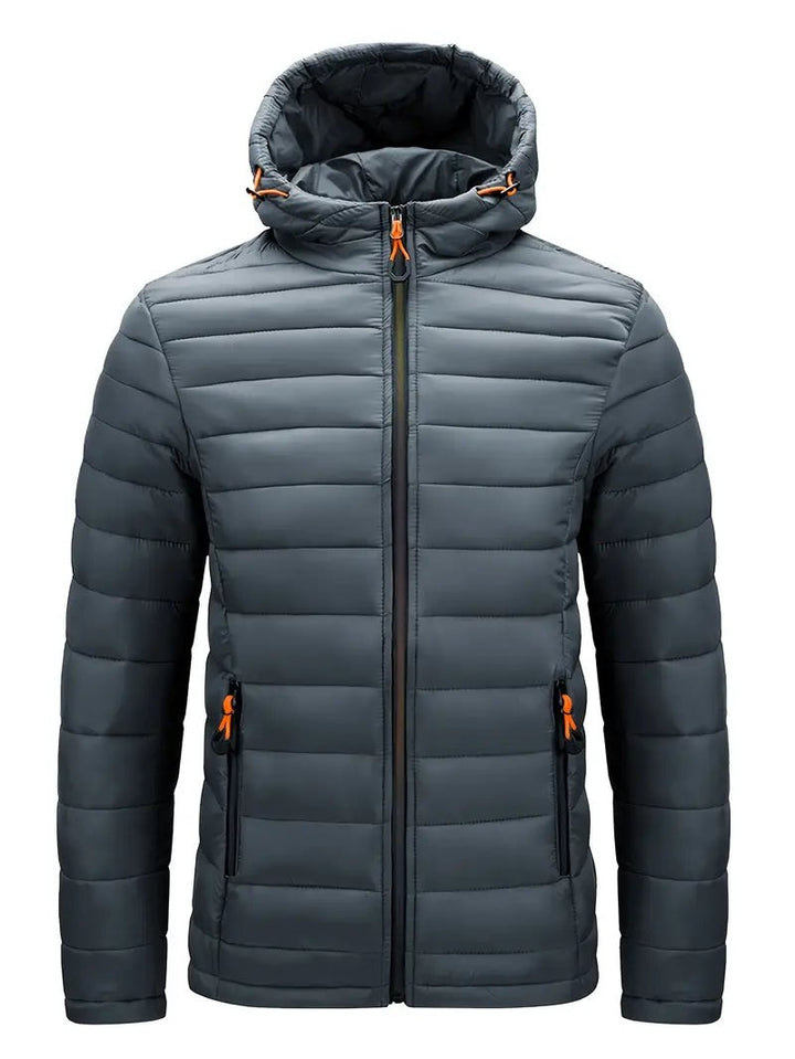 Graue Steppjacke mit Kapuze und kontrastfarbenen Zippern, Vorderansicht
