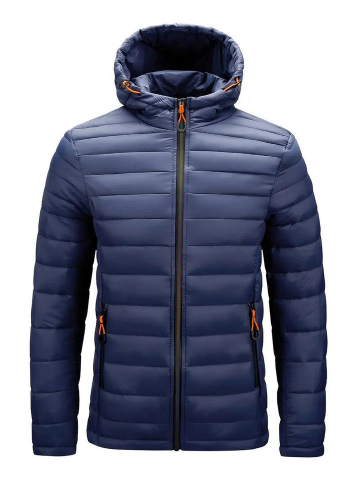 Dunkelblaue Steppjacke mit Kapuze und Reißverschlusstaschen, Frontansicht