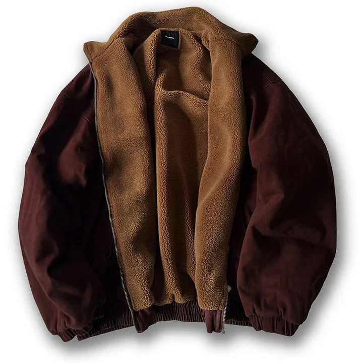 Dunkelbraune Jacke mit cognacfarbenem Fleecefutter, offen gezeigt