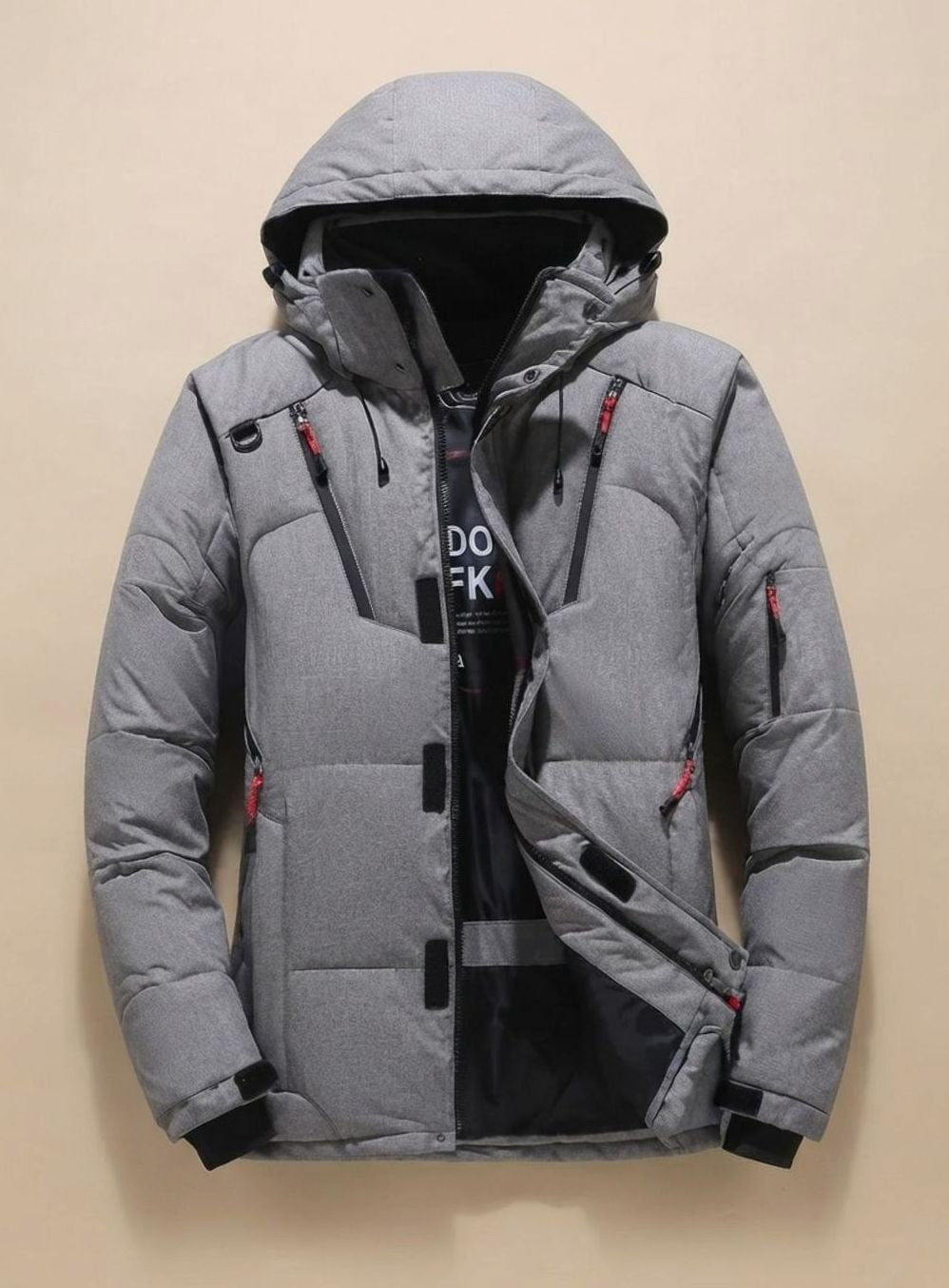Graue wattierte Winterjacke mit Kapuze und kontrastfarbenen Reißverschlüssen
